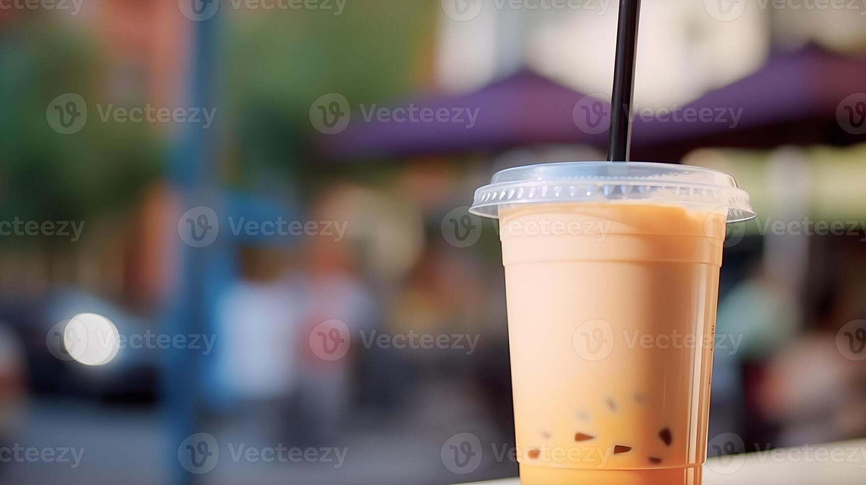 ai gerado gelado tailandês leite chá dentro plástico copo em mesa com borrado fundo foto