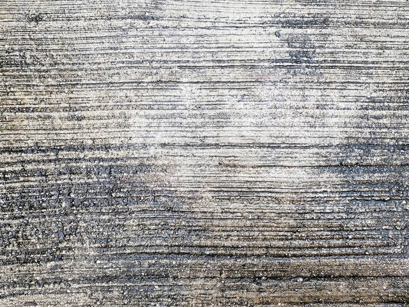 vintage e isolado concreto chão com uma em branco cinzento padronizar. foto