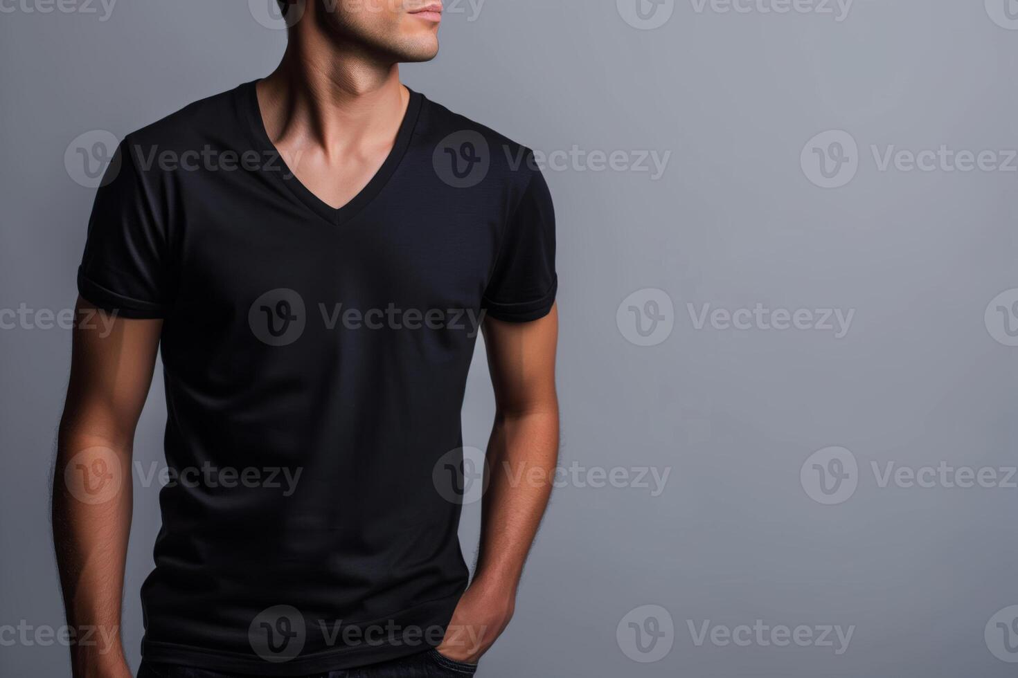 ai gerado uma jovem homem dentro uma Preto v pescoço camisa, isolado em uma cinzento fundo para uma brincar Projeto modelo foto