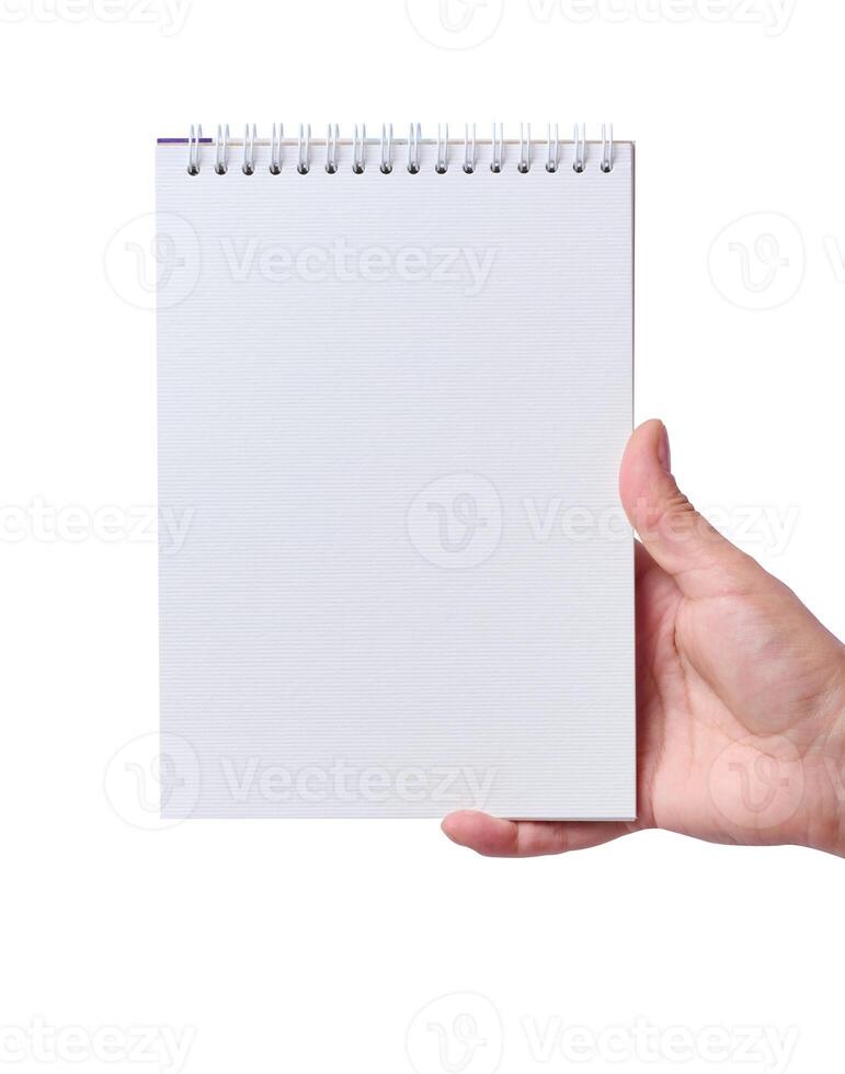 fêmea mão segurando a aberto bloco de anotações em uma branco isolado fundo foto