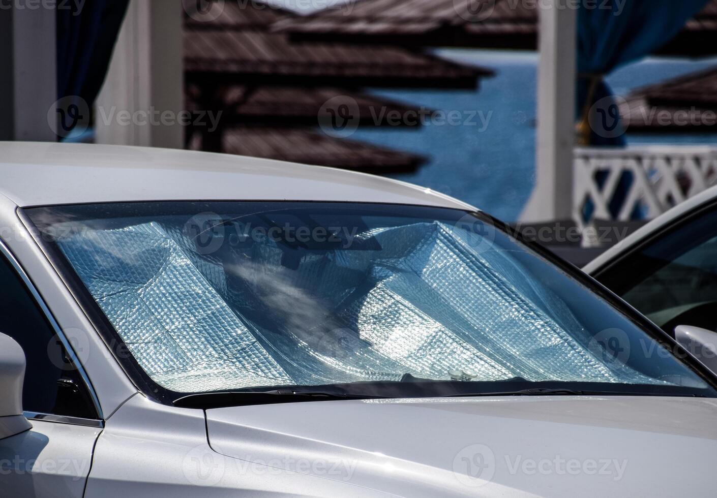 Sol refletor pára-brisas. proteção do a carro painel a partir de direto luz solar. foto