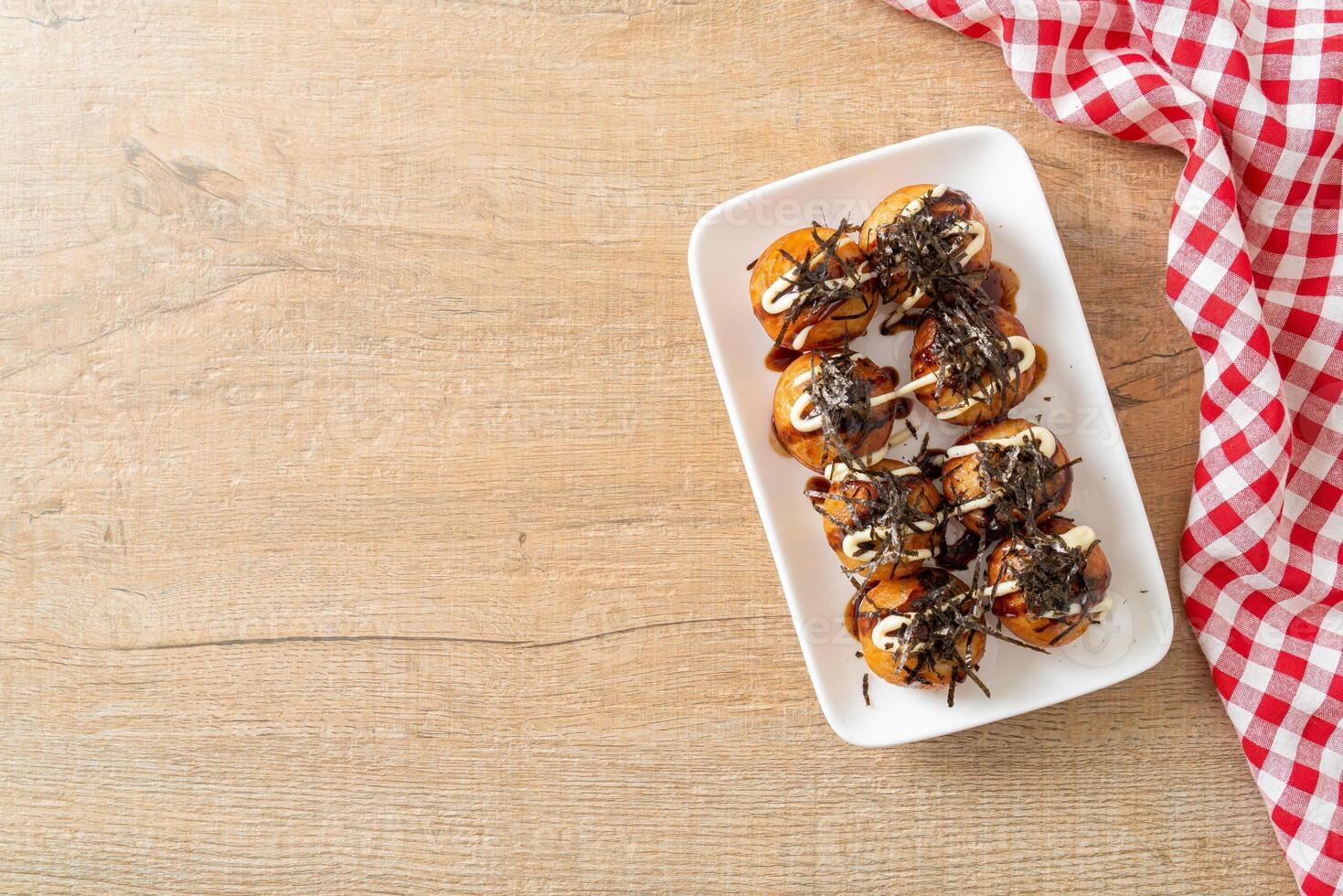 bolinhos de takoyaki ou bolinhas de polvo foto