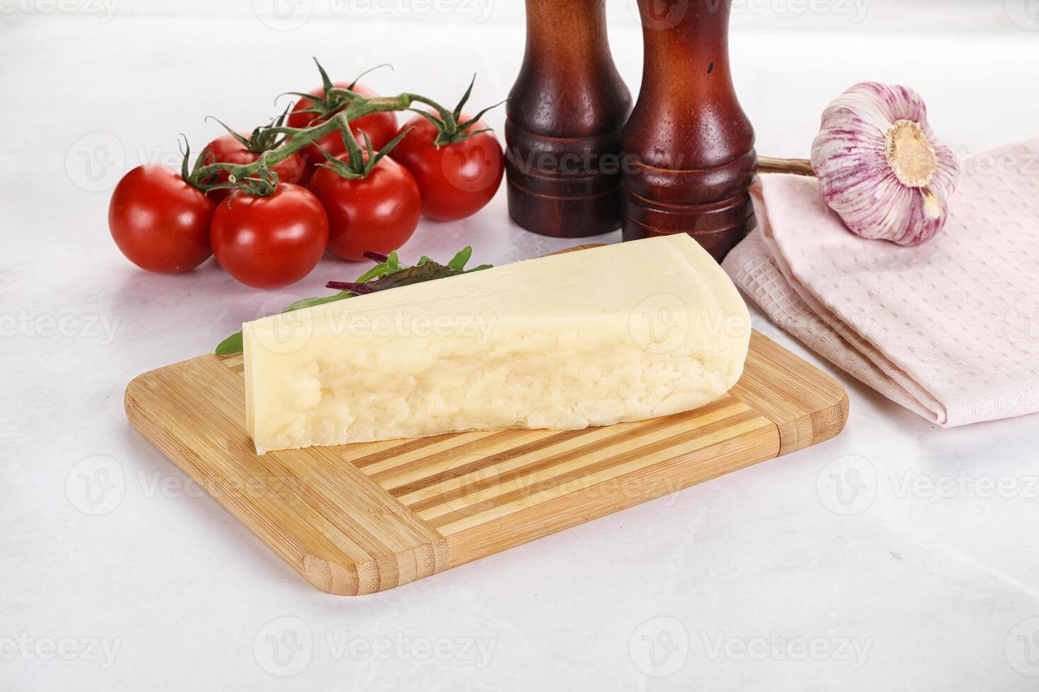 peça italiano Difícil parmesão queijo foto