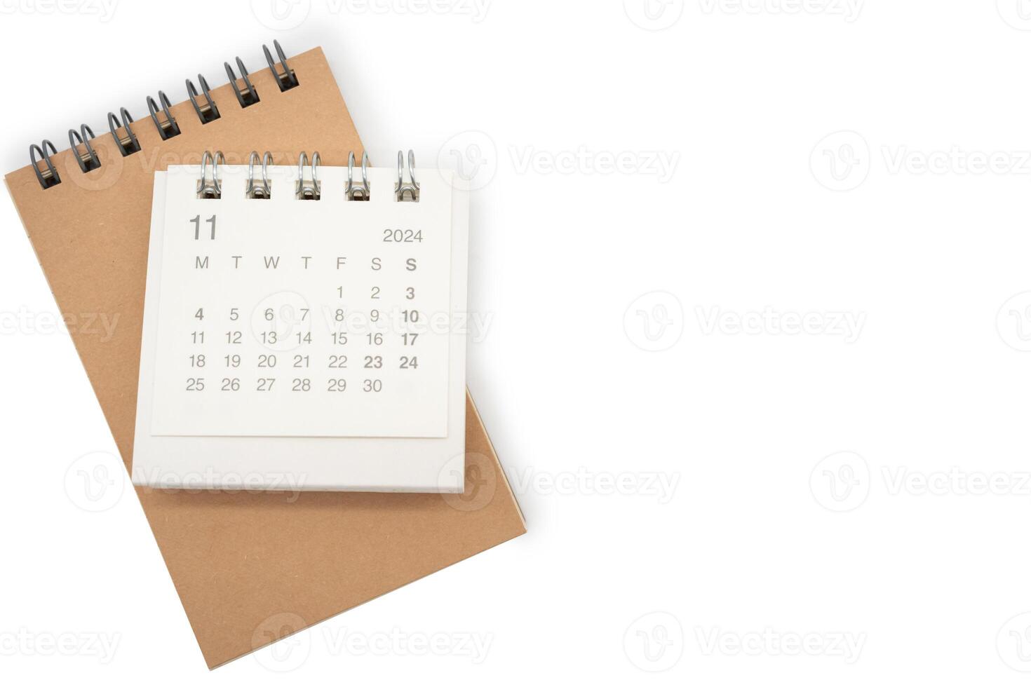 simples escrivaninha calendário para novembro 2024 e em branco memorando isolado em branco fundo. calendário conceito com cópia de espaço. foto
