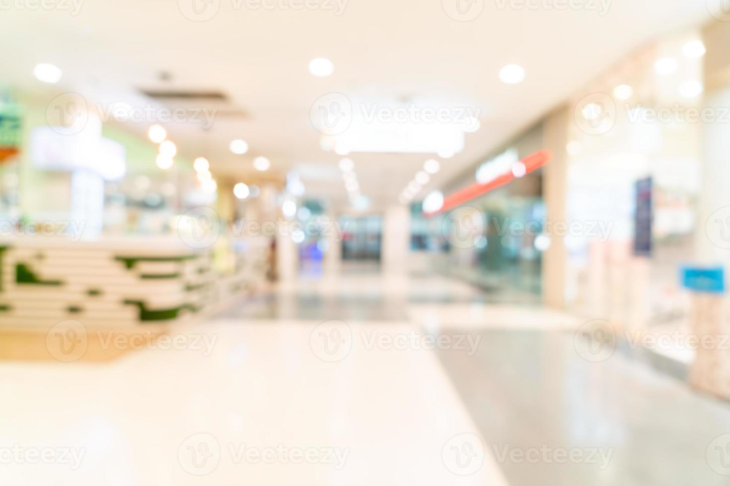 loja de borrão abstrata e loja de varejo em shopping center foto