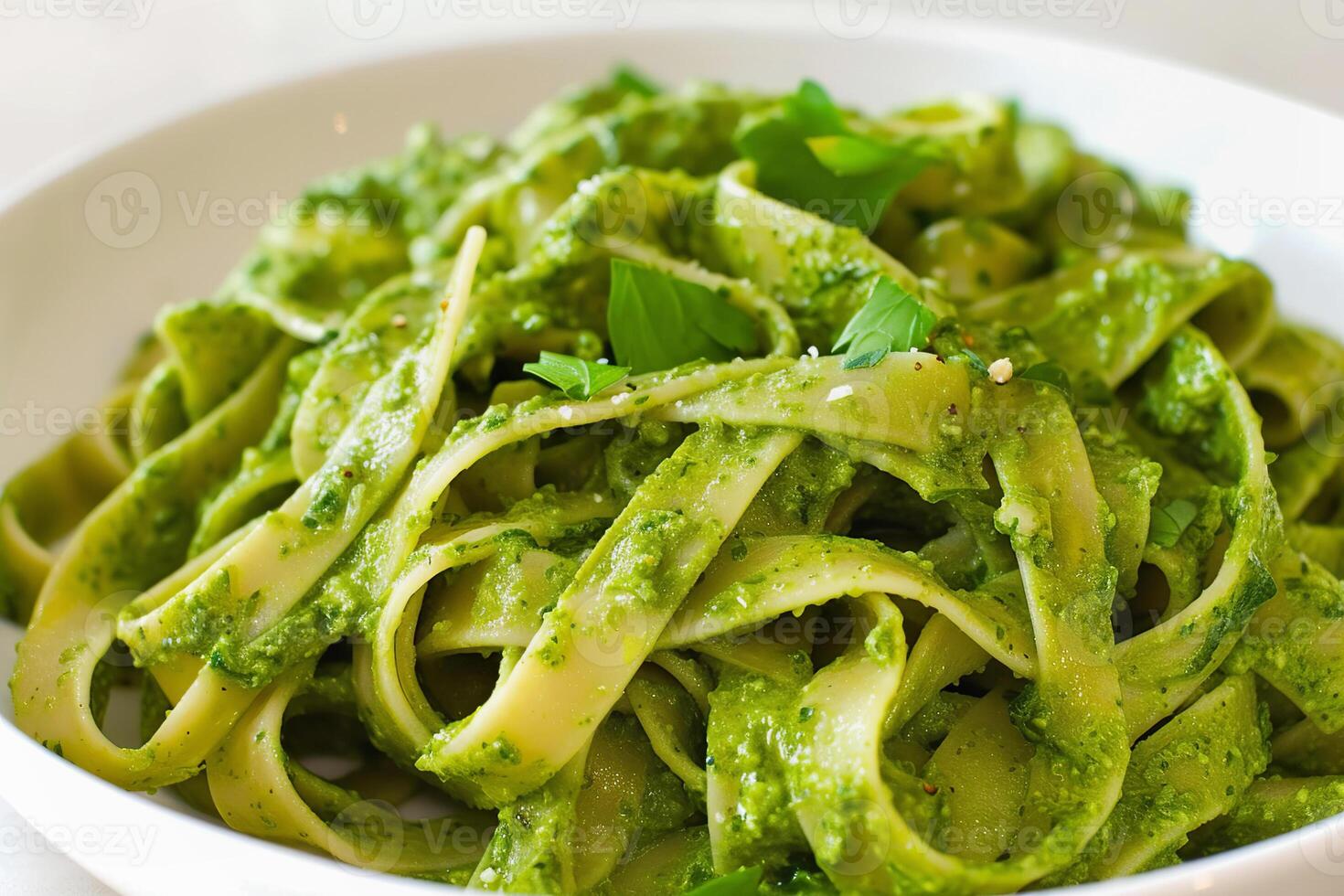 ai gerado fettuccine rampa pesto massa enfeitado com fresco ervas, fechar acima foto