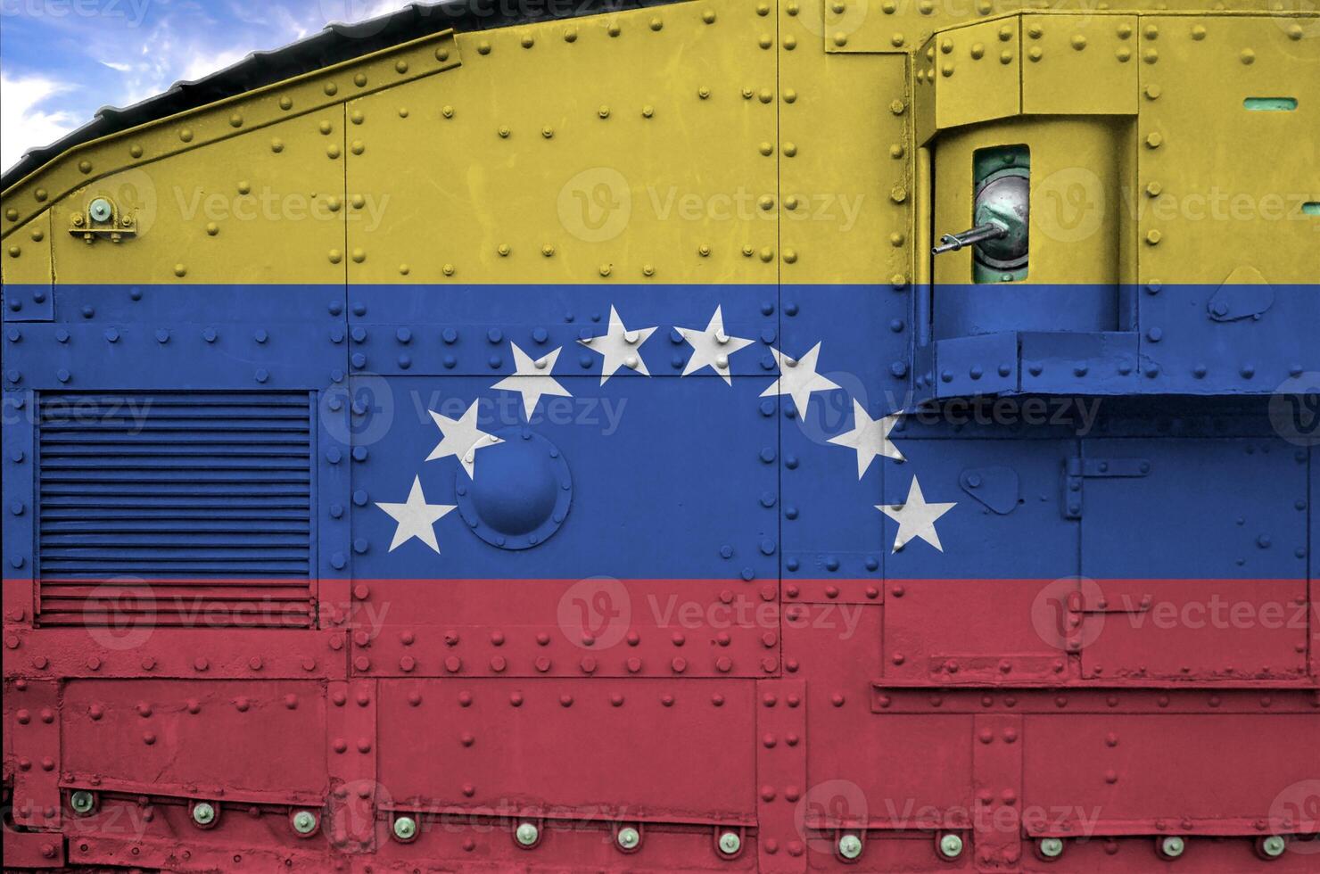 Venezuela bandeira retratado em lado parte do militares blindado tanque fechar-se. exército forças conceptual fundo foto