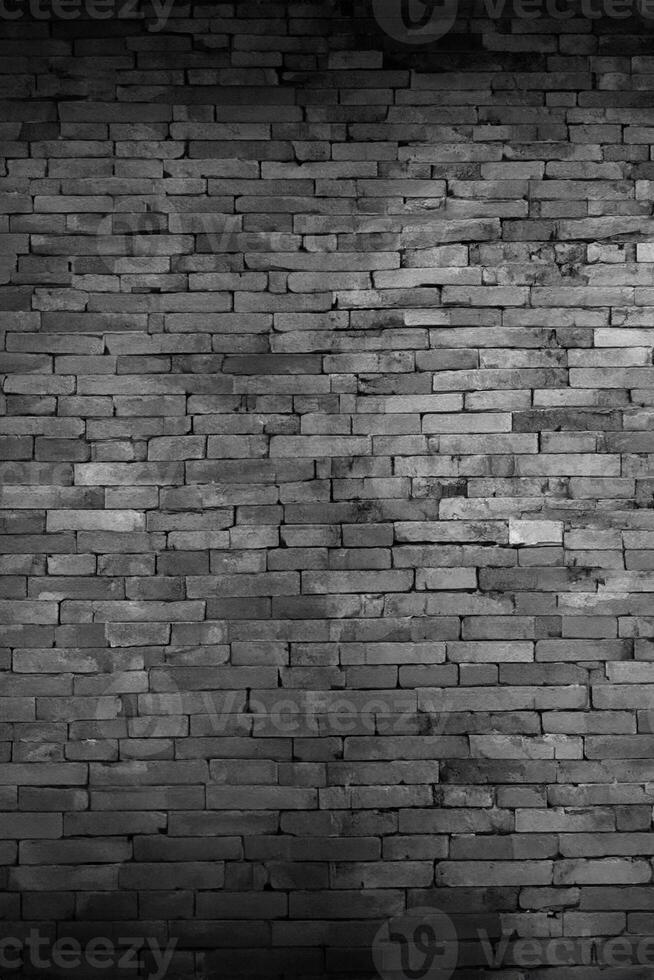 Preto tijolo paredes este estão não gesso fundo e textura. a textura do a tijolo é Preto. fundo do esvaziar tijolo porão muro. foto