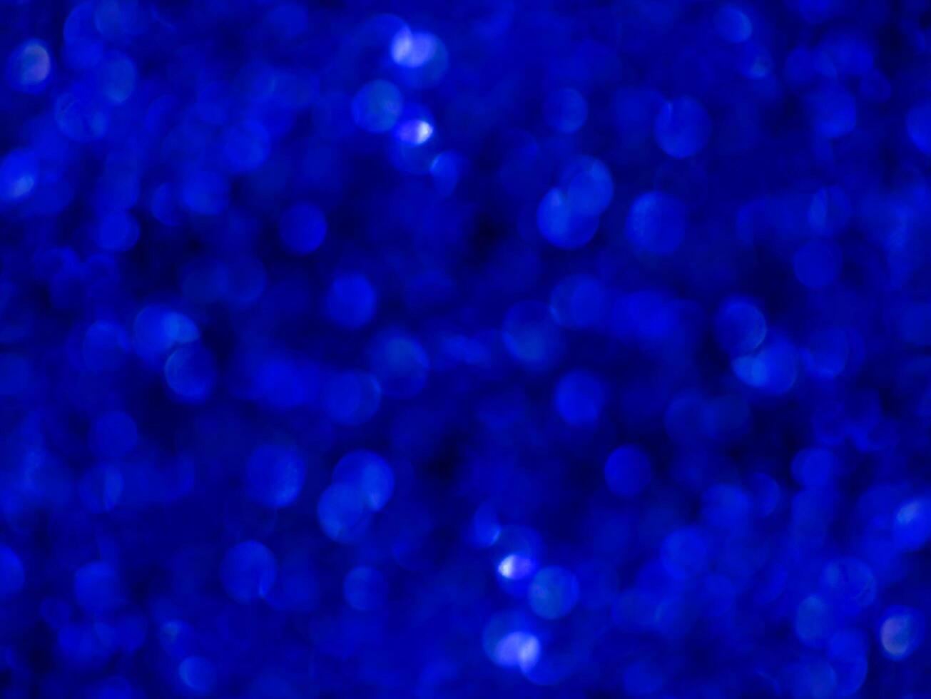 azul espumante brilhar bokeh fundo. foto