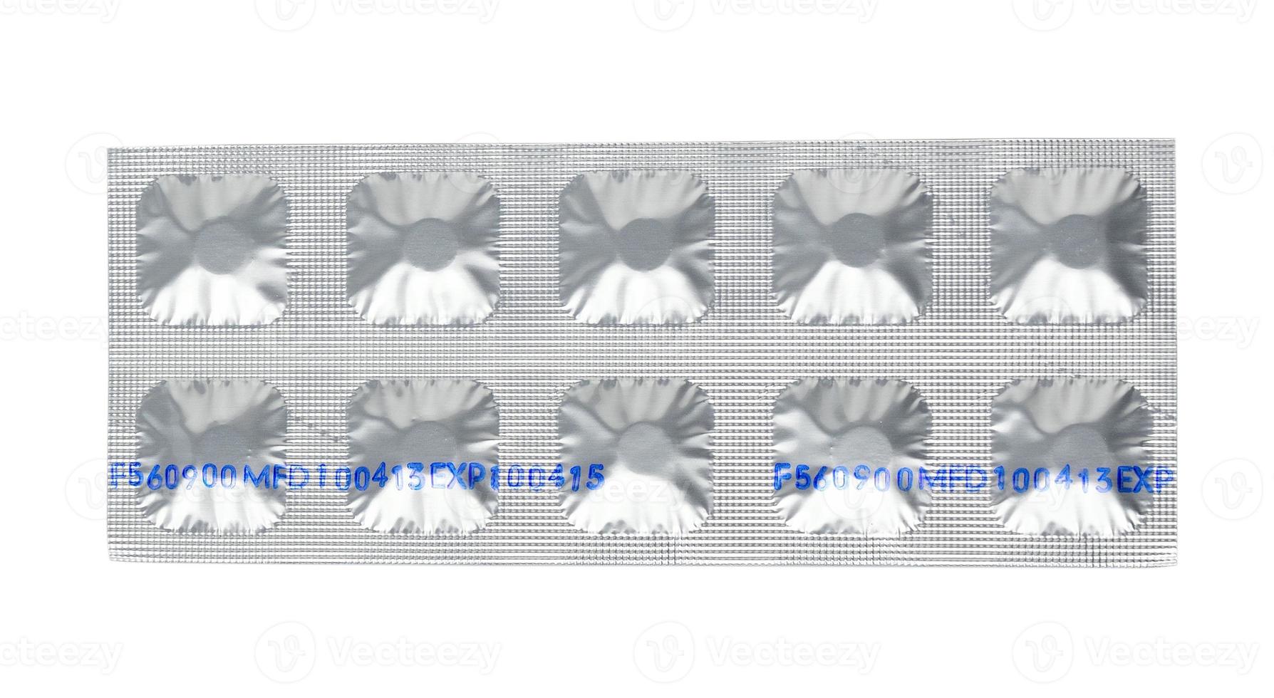conjunto de comprimidos em uma embalagem de papel alumínio foto