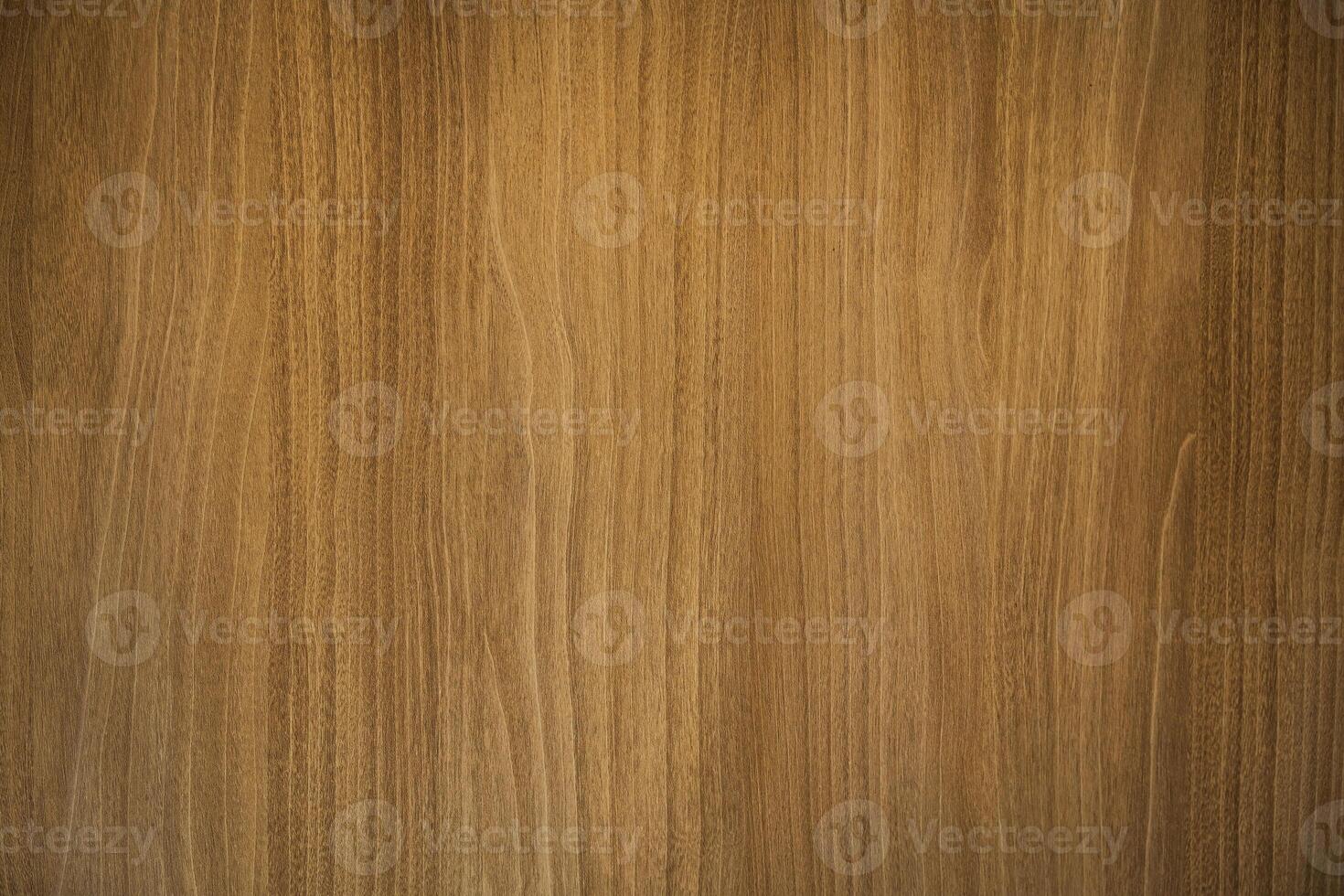 uma de madeira superfície com uma granulado textura. a madeira parece para estar envelhecido e tem uma rústico sentir. madeira fundo conceito. foto
