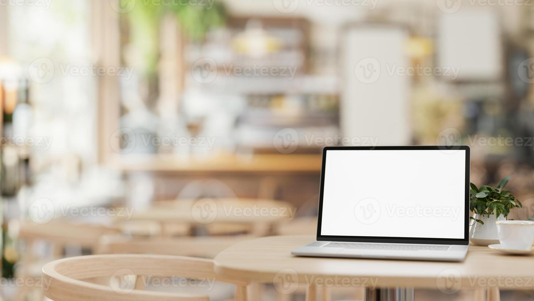 uma Tela branca computador portátil computador brincar em uma de madeira mesa dentro uma contemporâneo acolhedor café fazer compras. foto
