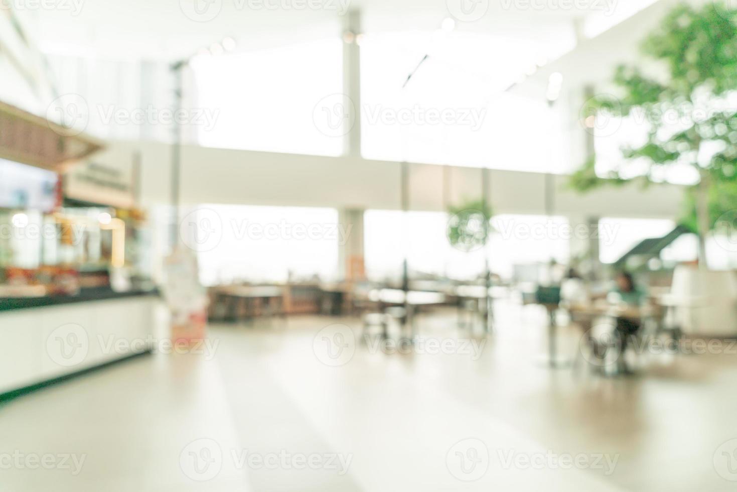 borrão abstrato praça de alimentação em shopping center foto