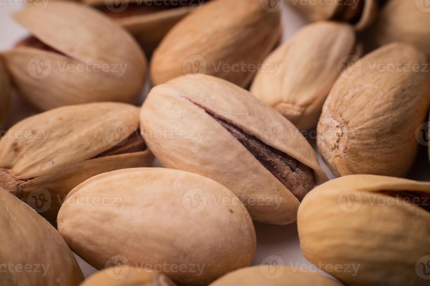 muitos fechadas pistachios dentro macro fechar-se. saudável Comida fundo com seletivo suave foco foto