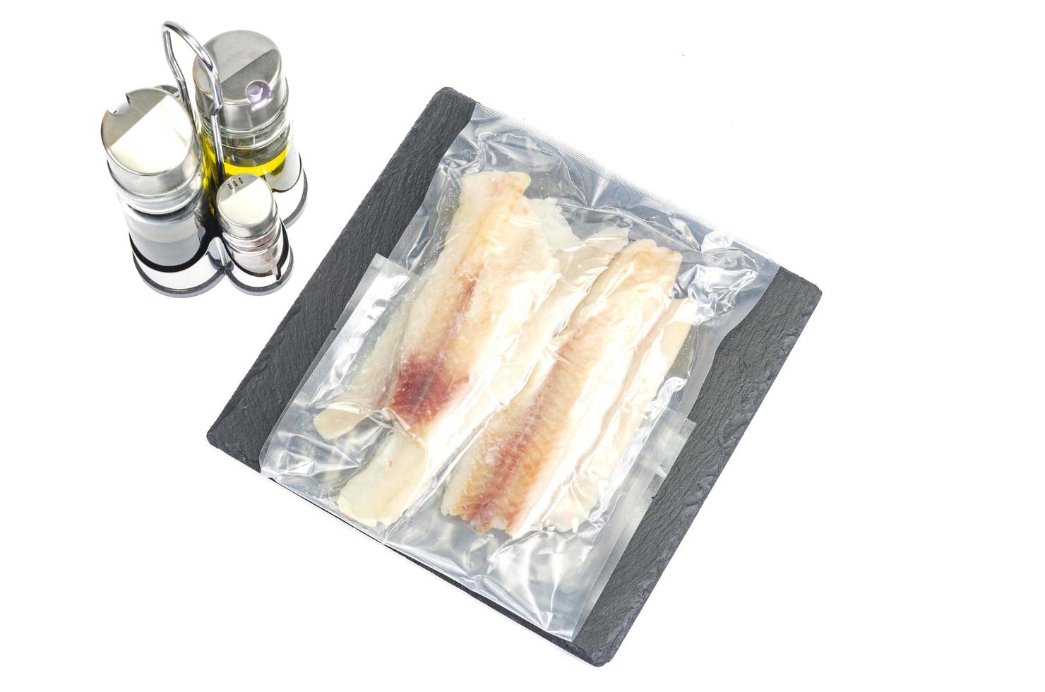 embalagem de filés congelados de peixe branco, pollock foto