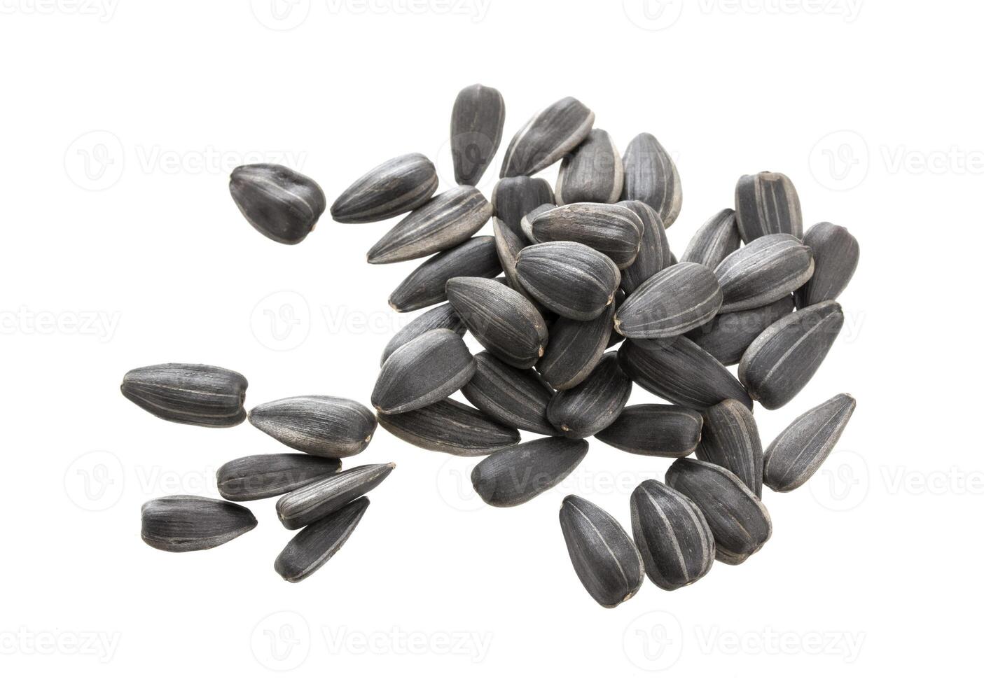 pilha do girassol sementes isolado em branco foto