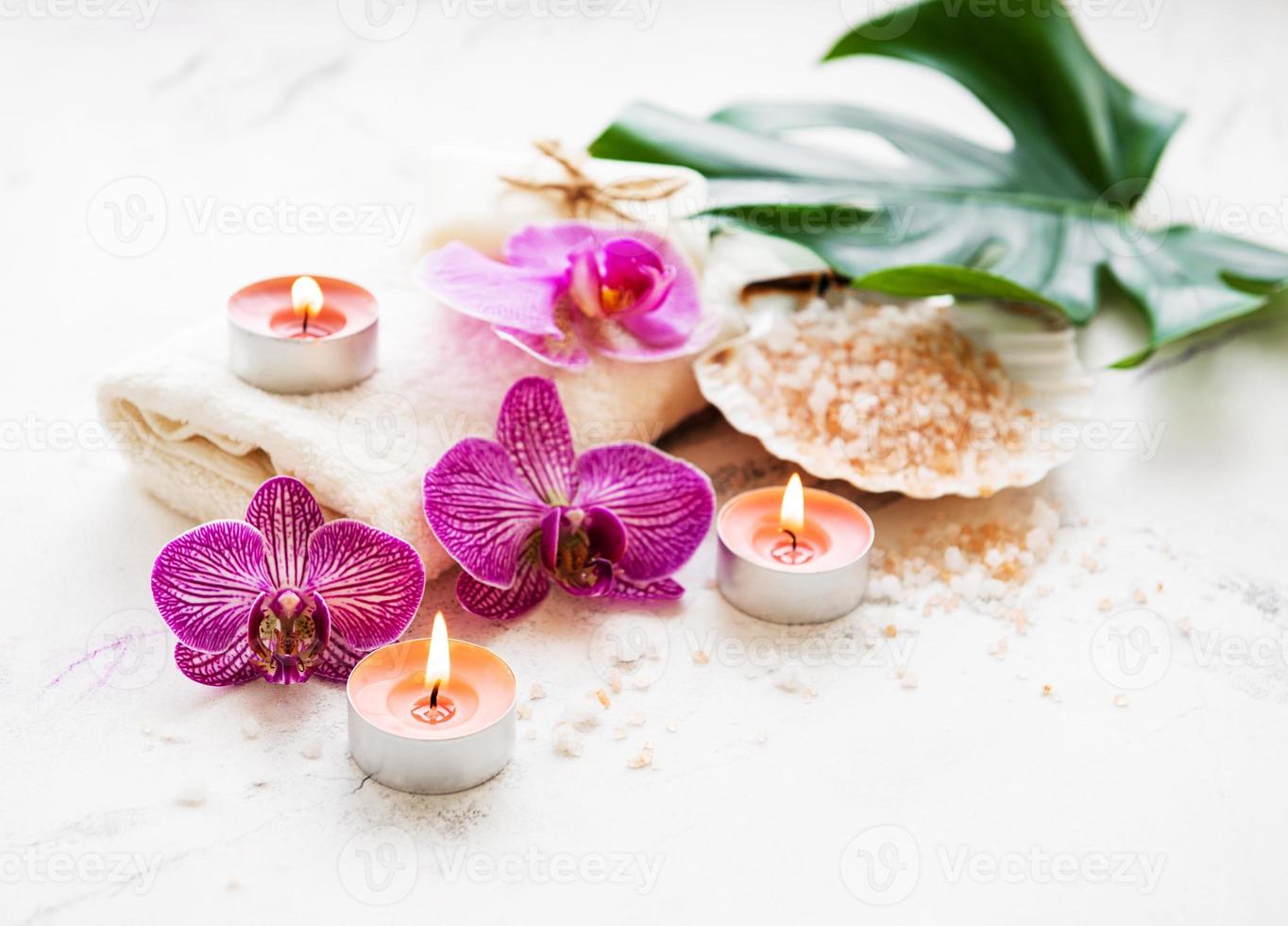 ingredientes naturais de spa com flores de orquídea foto