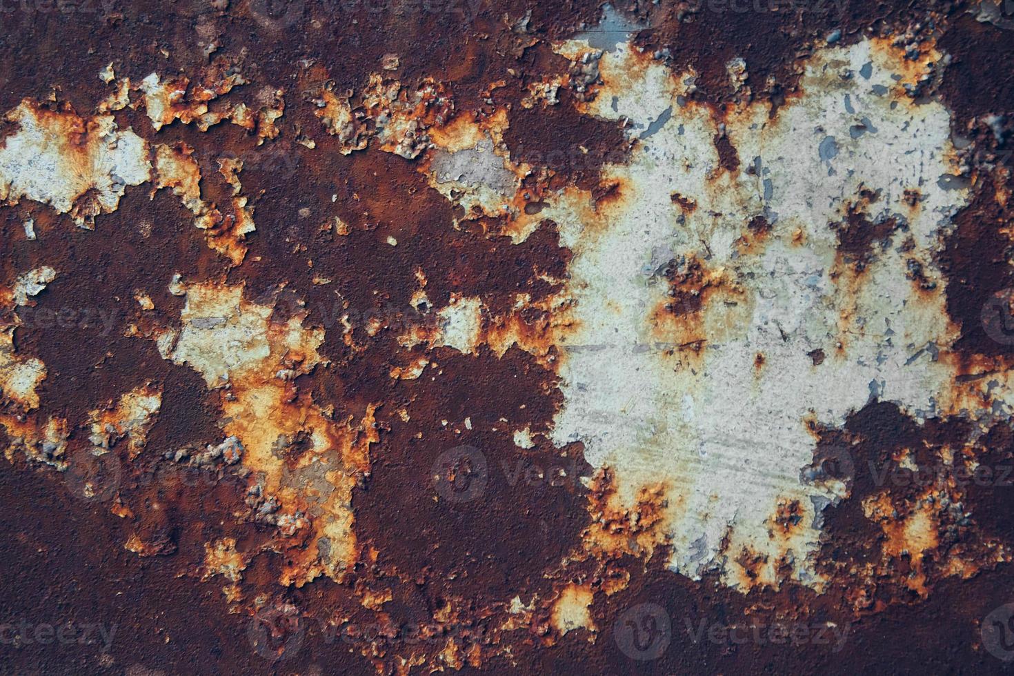 superfície de metal enferrujada com resíduo de tinta azul como fundo foto