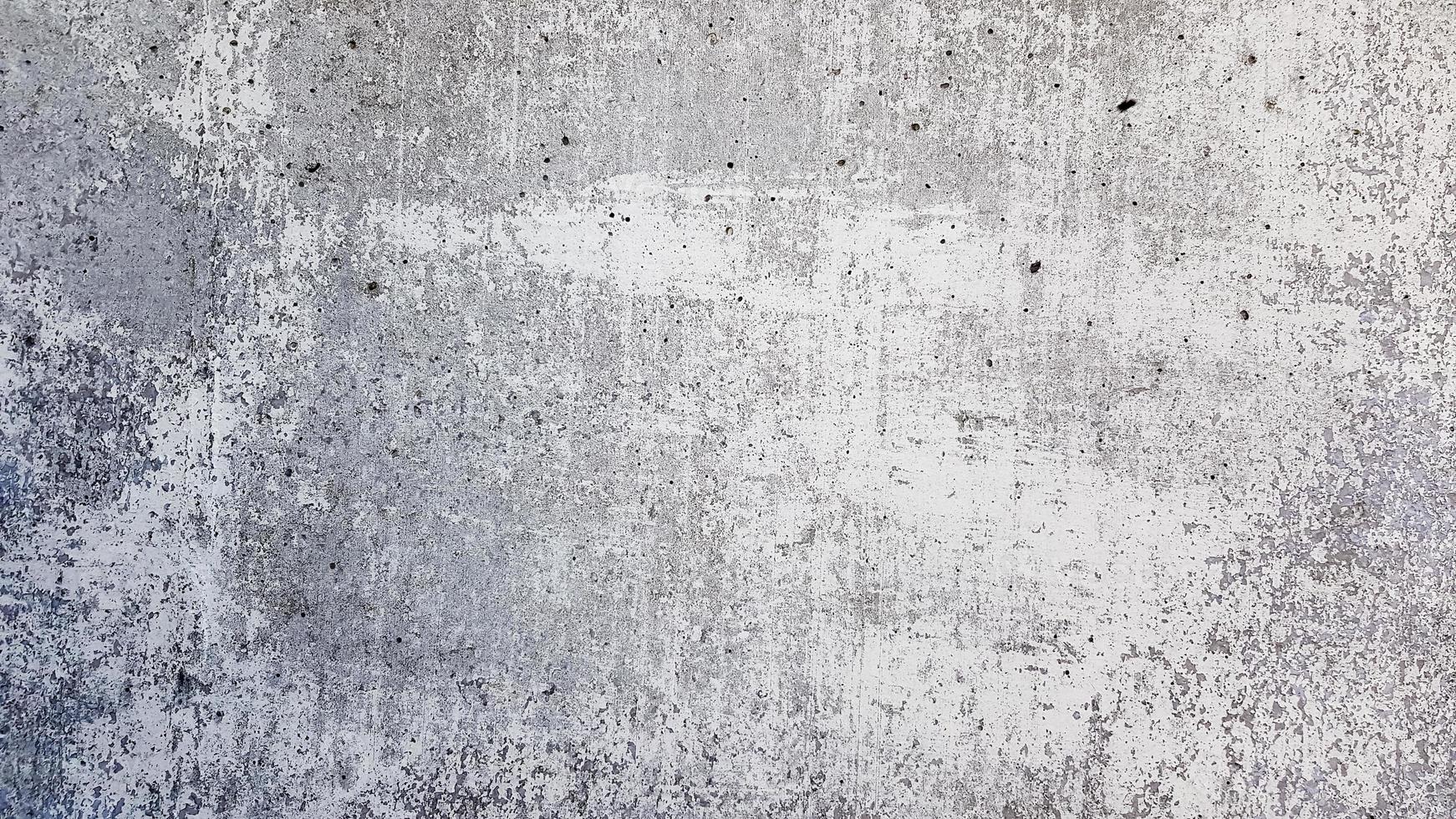 textura do velho muro de concreto cinza para o fundo foto