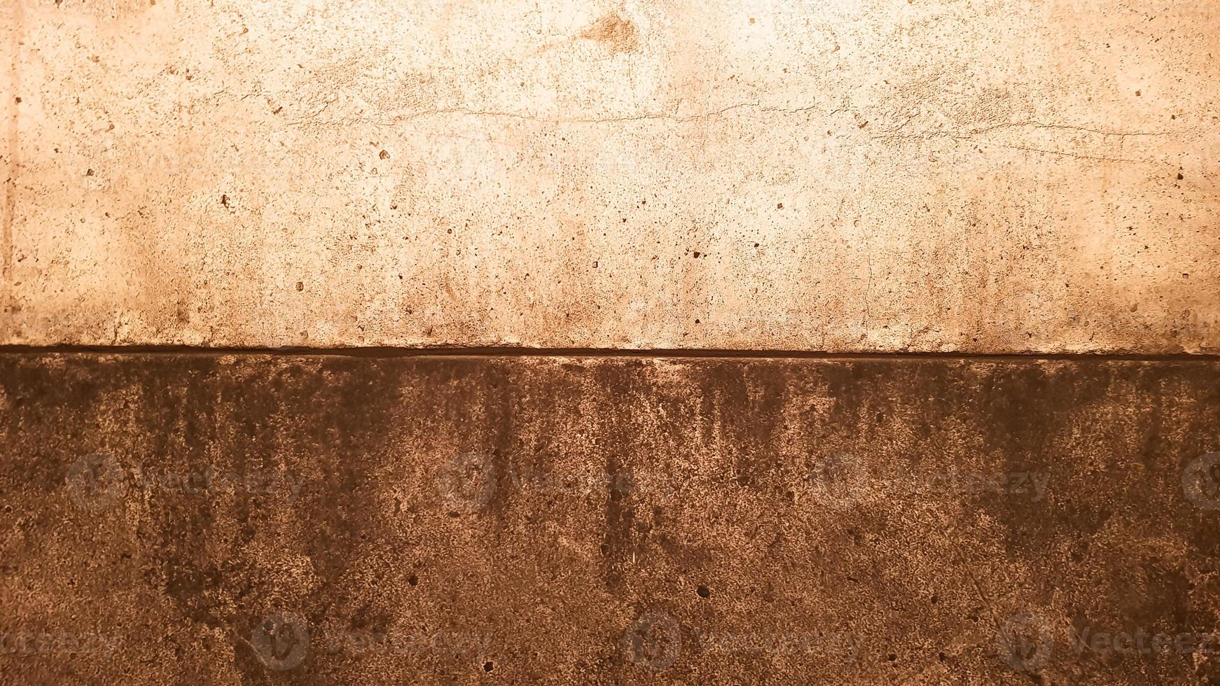 textura de pedra de granito. fundo de pedra dourada marrom. superfície de parede de pedra vazia velha ou fundo de textura de papel marrom sujo antigo marrom ou bege. grunge de ouro marrom. foto