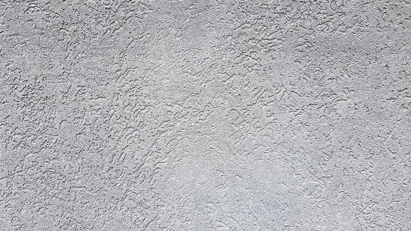 fundo abstrato cinza. lindo estuque texturizado cinza na parede. fundo de estuque cinza. foto