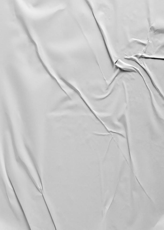 papel colado para textura de pôster. modelo de papel amassado e enrugado branco em branco para segundo plano. papel úmido emaranhado amassado para pôsteres de maquete. foto