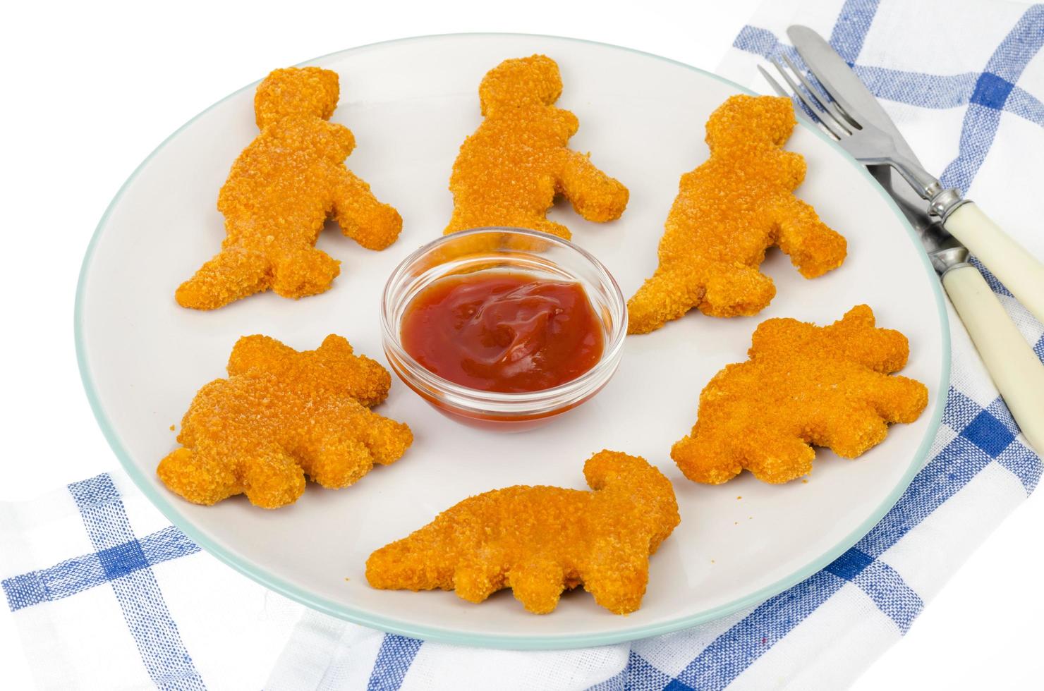 pratos de comida para bebé, comida rápida, nuggets. foto de estúdio