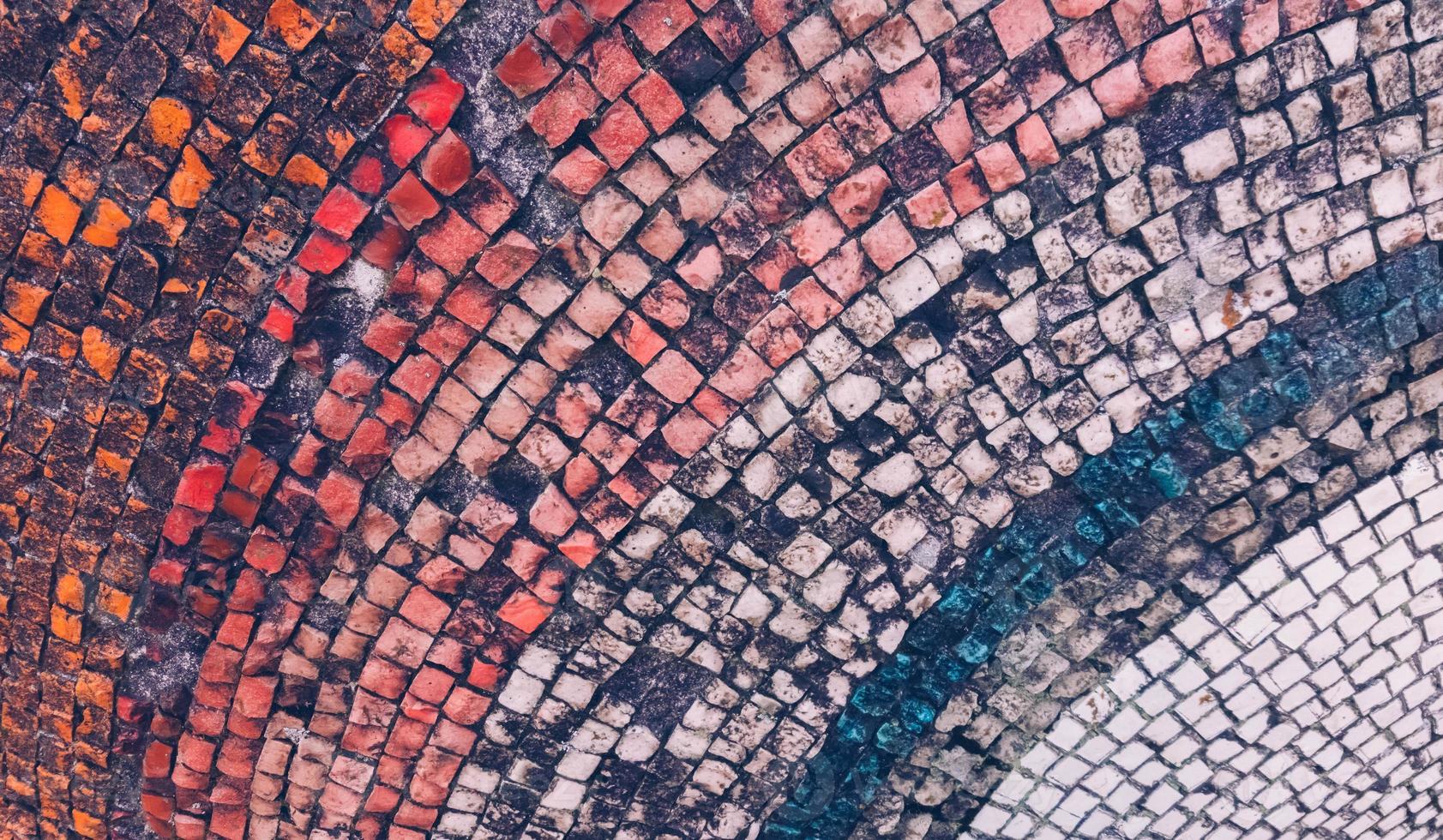 mosaico antigo multicolorido de pequenas pedras foto