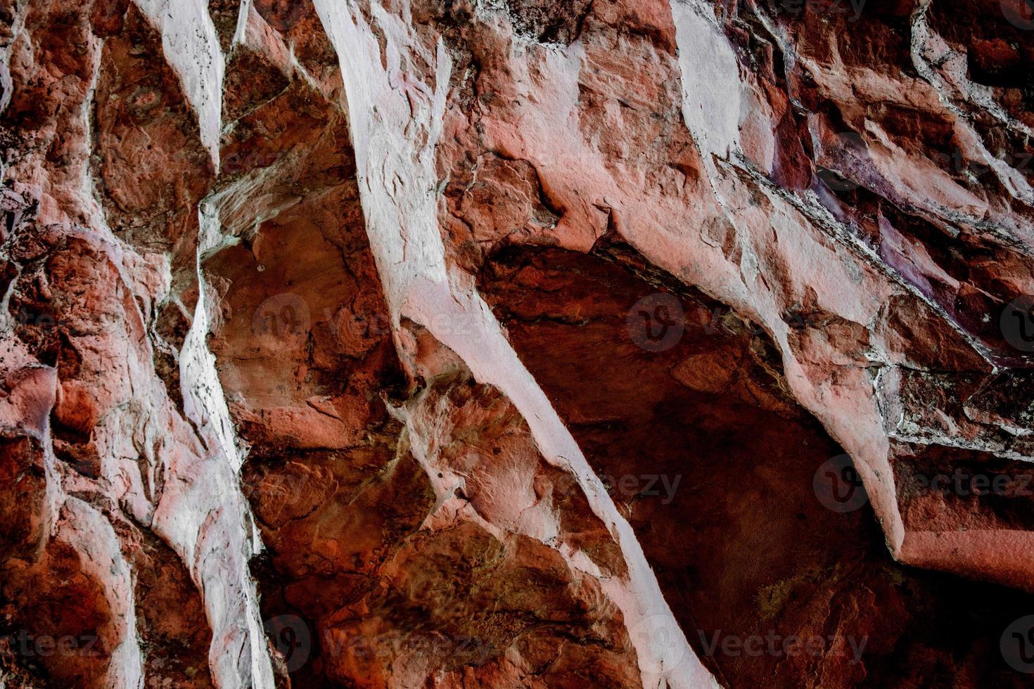 textura de pedra de rocha vermelha e branca isolada e enorme coleção de fundo de pedras de granito foto