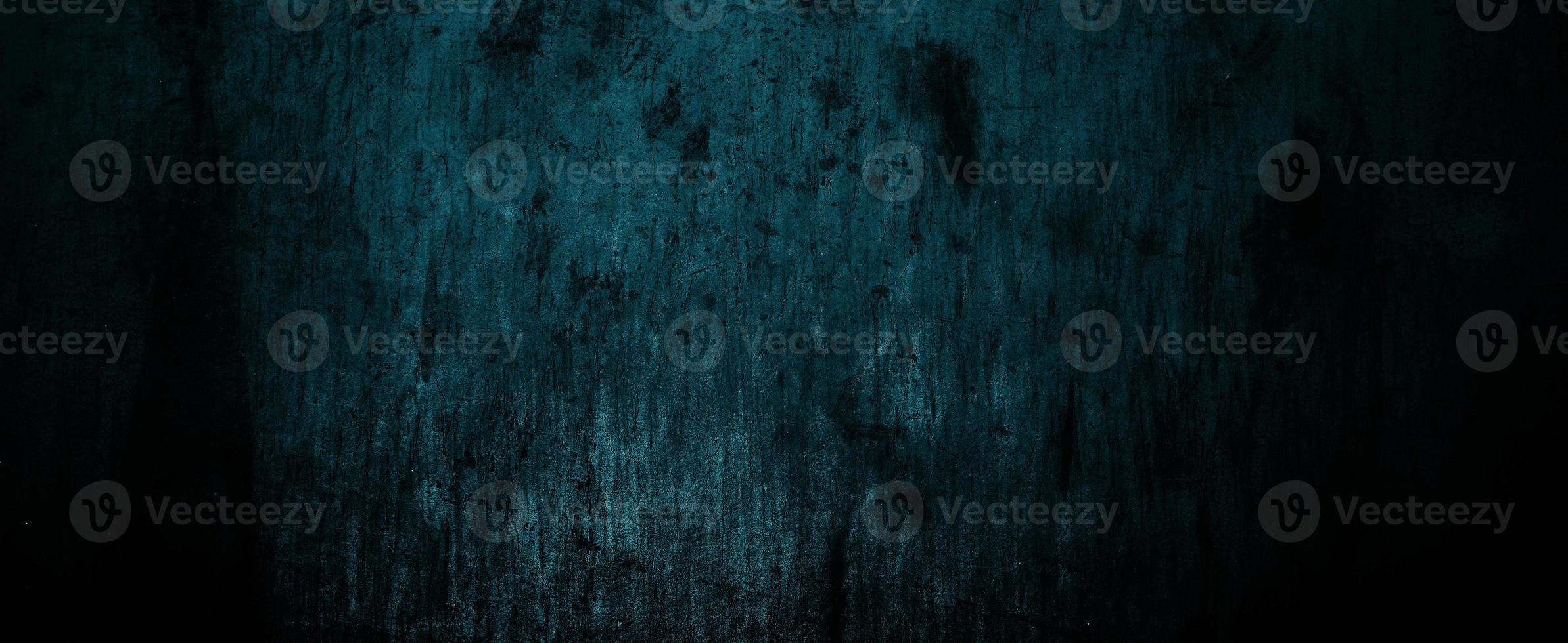paredes azuis escuras assustadoras, textura de cimento de concreto escuro ligeiramente claro para o fundo foto