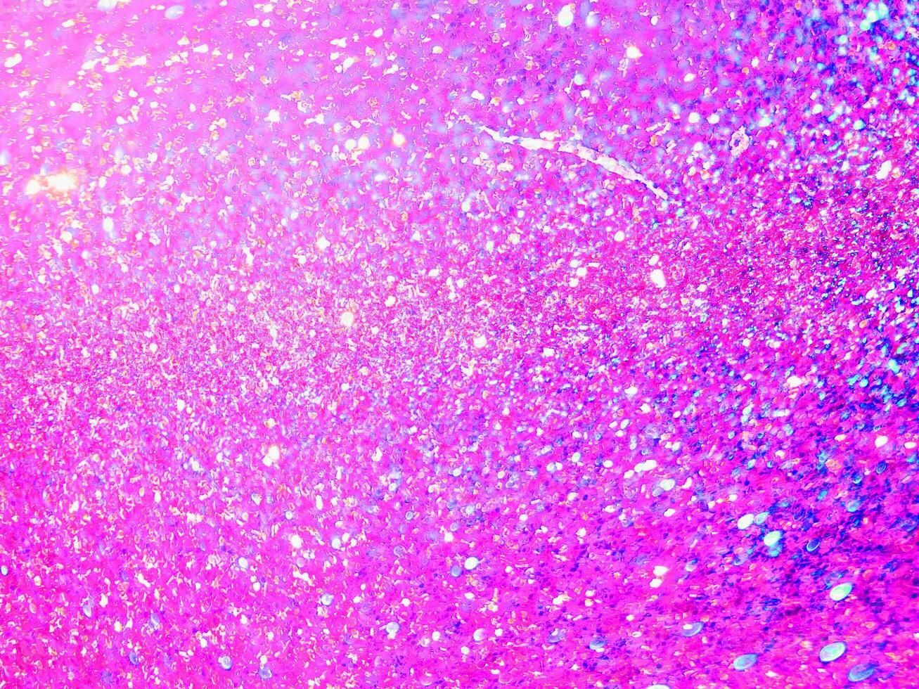 textura de piso de cimento áspero abstrato glitter rosa para desfocar o fundo natal foto