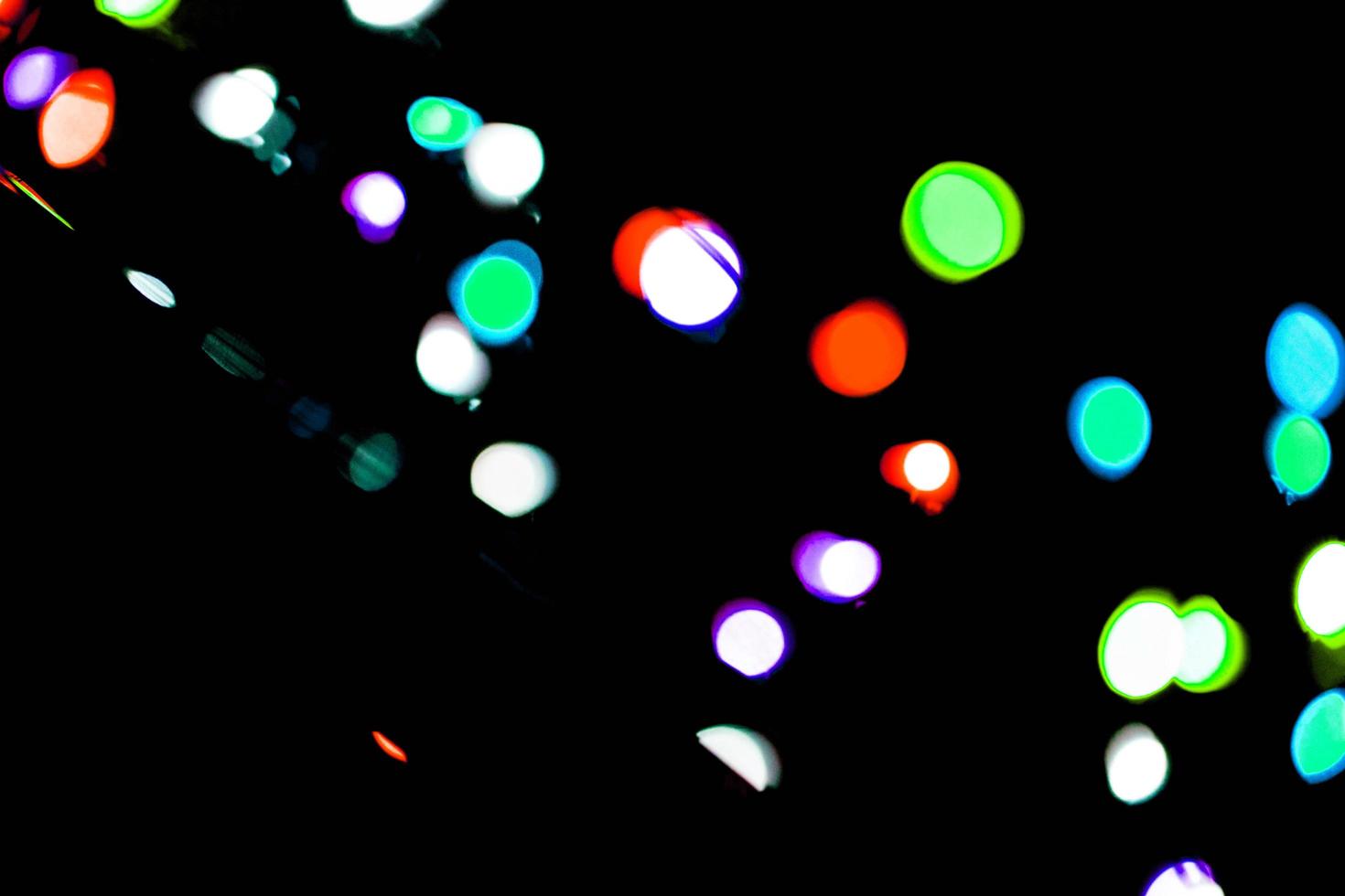 fundo multicolorido desfoque colorido e fundo do círculo e efeito de luzes de natal de desfoque de círculo abstrato foto