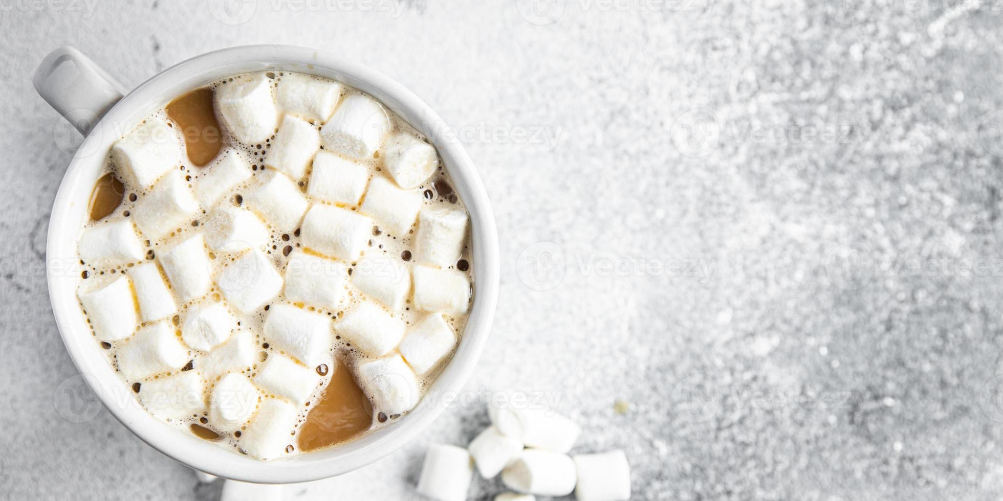 marshmallow de cacau quente ou bebida de chocolate com café foto