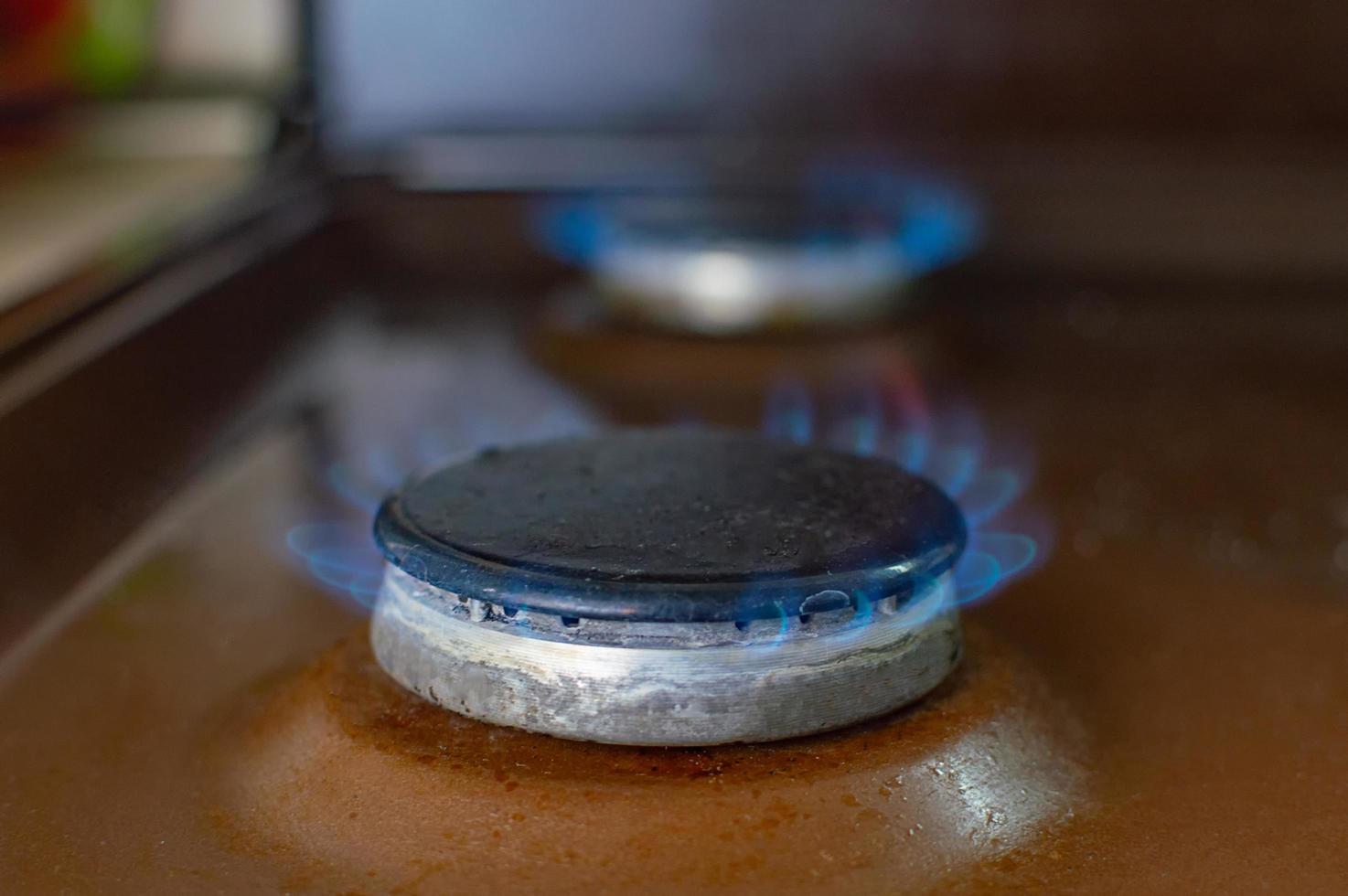 queimador de gás na cozinha foto