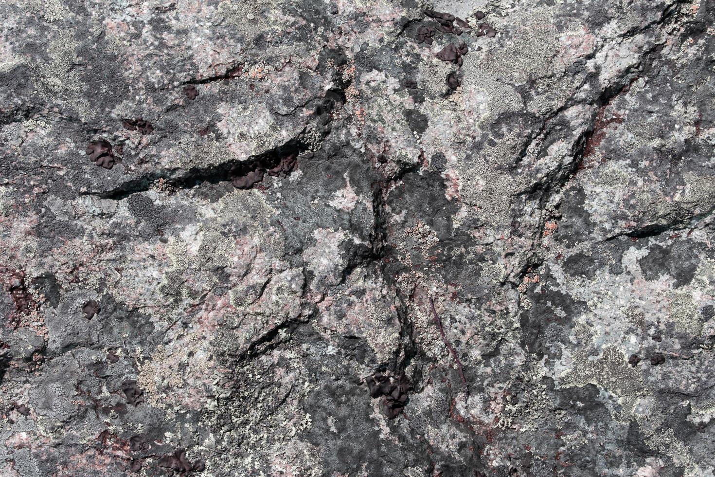 textura de rocha cinza e preta pedras pretas cinza-escuras são todas de mármore e textura para fabricação de ladrilhos foto