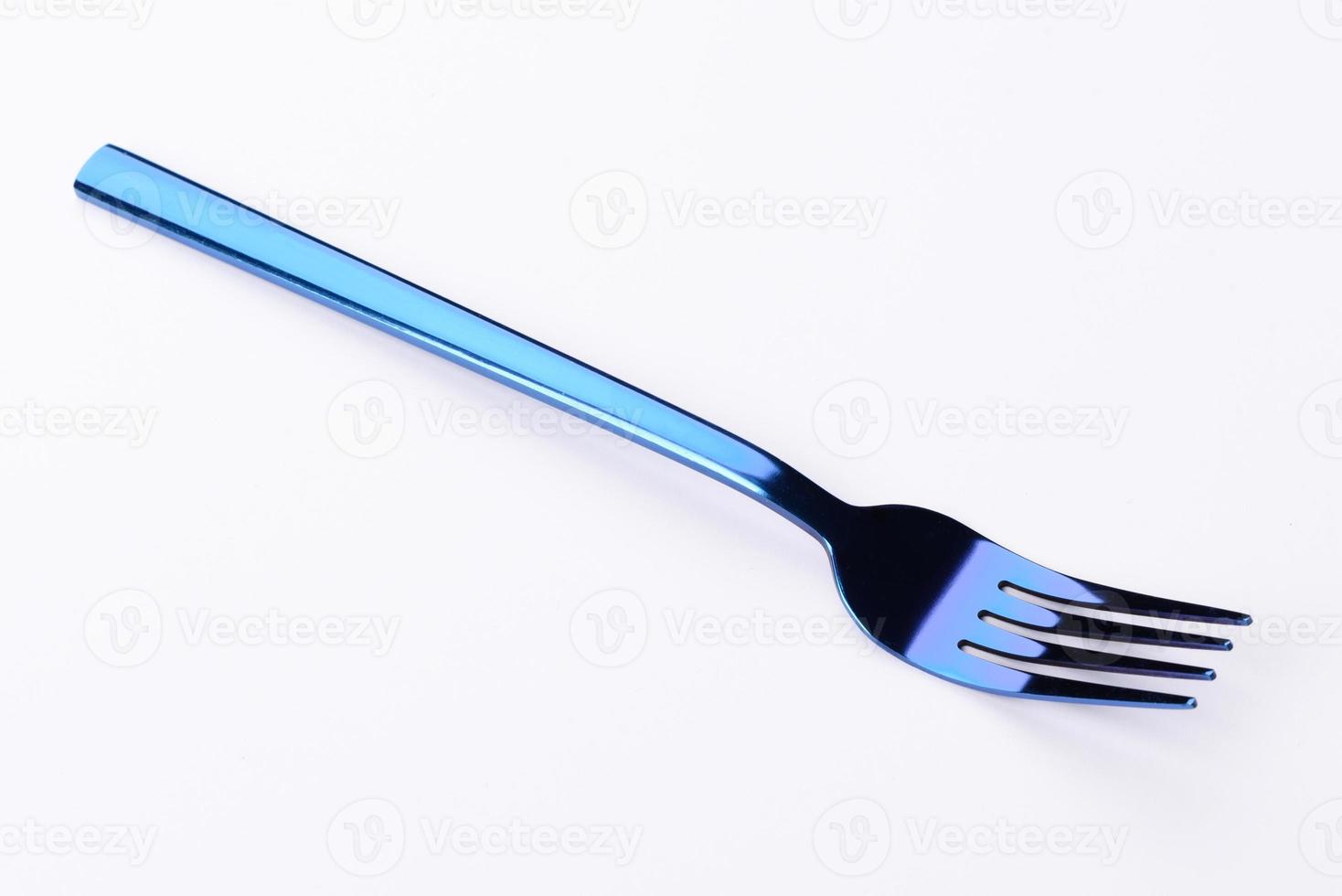 lindo jantar garfo isolado em um fundo branco. talheres em fundo branco foto