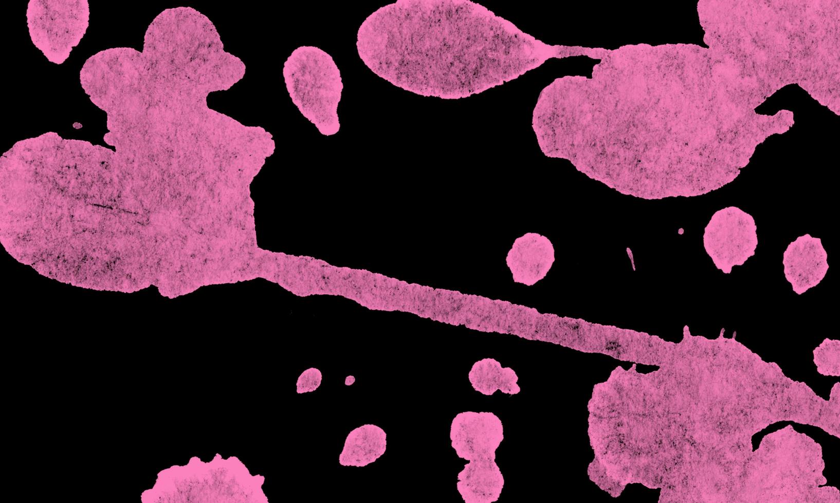 salpicos de tinta rosa cravo. respingos de grunge. fundo abstrato. foto