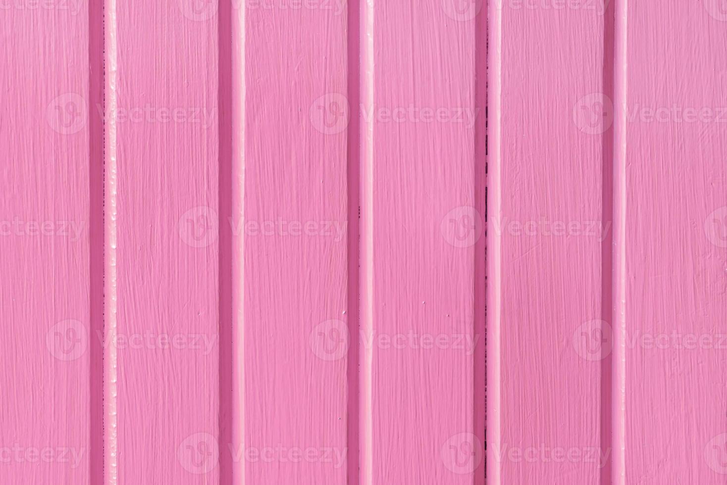 fundo de textura de parede de prancha de madeira rosa foto