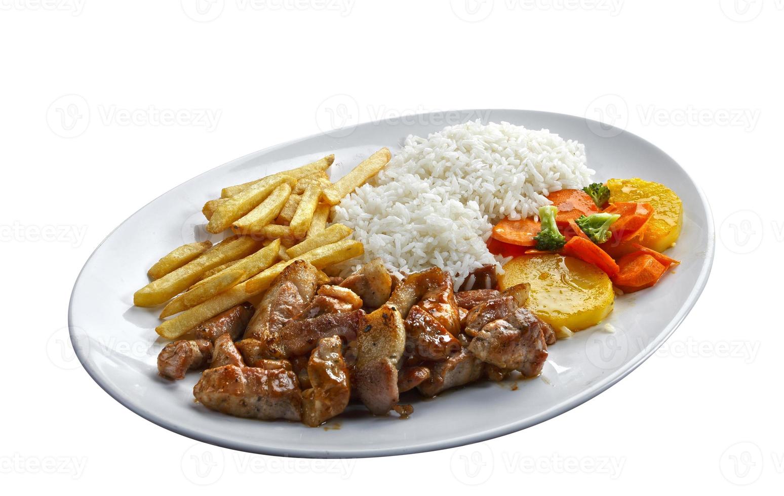 carne de porco com arroz e batatas foto