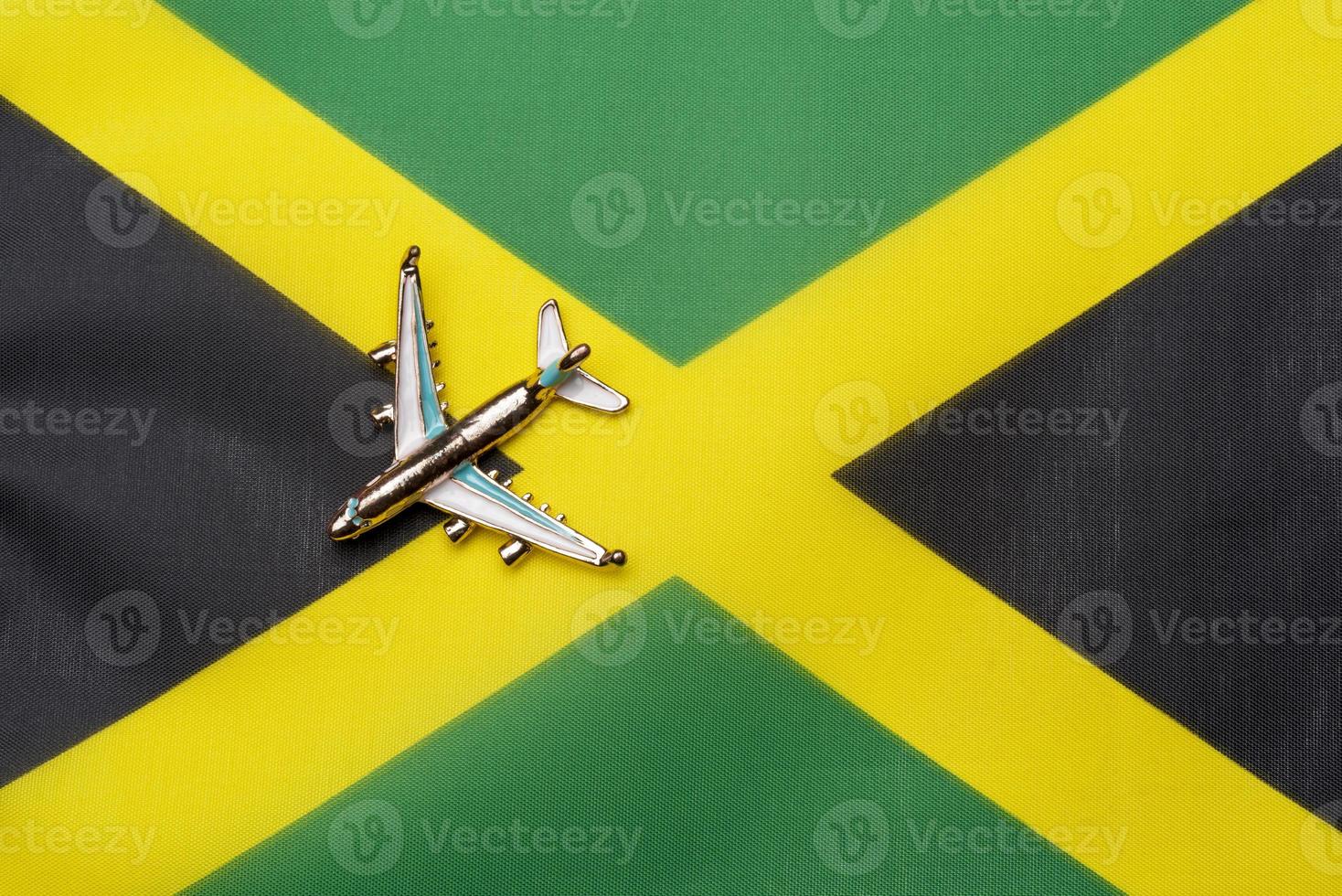 o avião da bandeira jamaicana, o conceito de viagens e turismo. foto