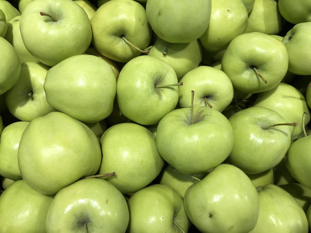macro foto maçãs verdes. banco de imagens de fundo de frutas de maçã verde