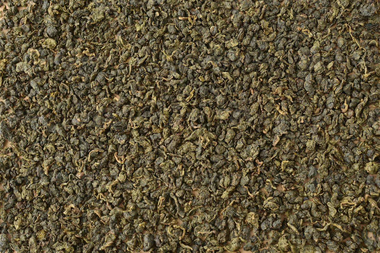 fundo de chá verde chinês, leite oolong, textura de folhas de chá natural, pano de fundo de chá fermentado foto