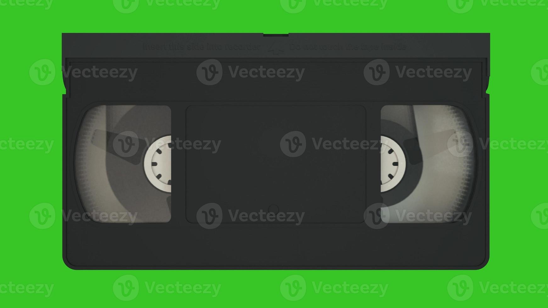 cassete vhs. sistema de gravação de fita de vídeo antigo. cassete de vídeo isolada na tela verde. renderização em 3D foto