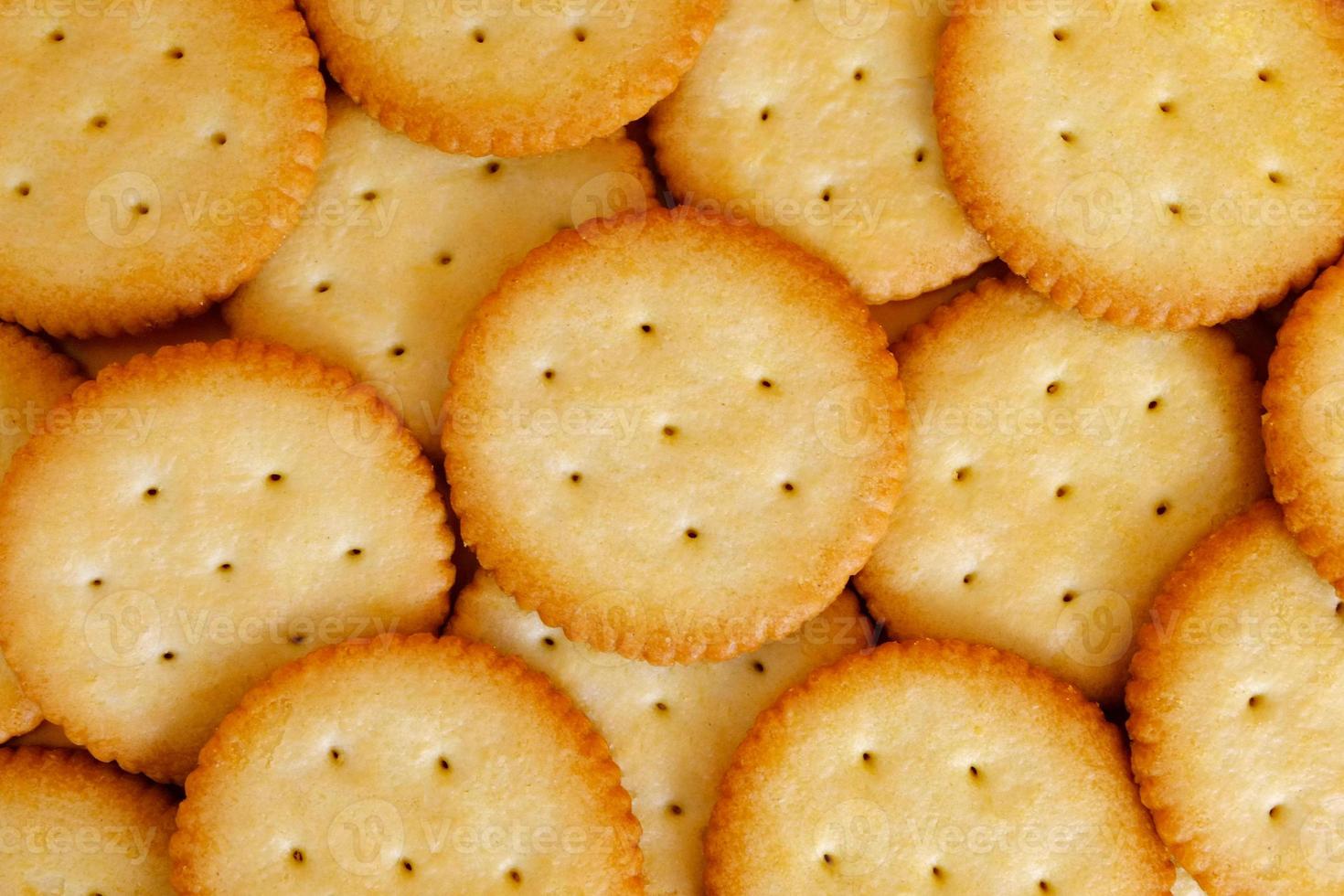 feche o grupo de fundo de textura de biscoito, pano de fundo de biscoito de sabor natural, biscoito macro crocante foto