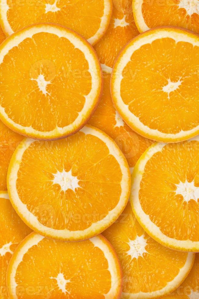 laranjas frutas e laranjas fatias fundo de alimentos saudáveis foto
