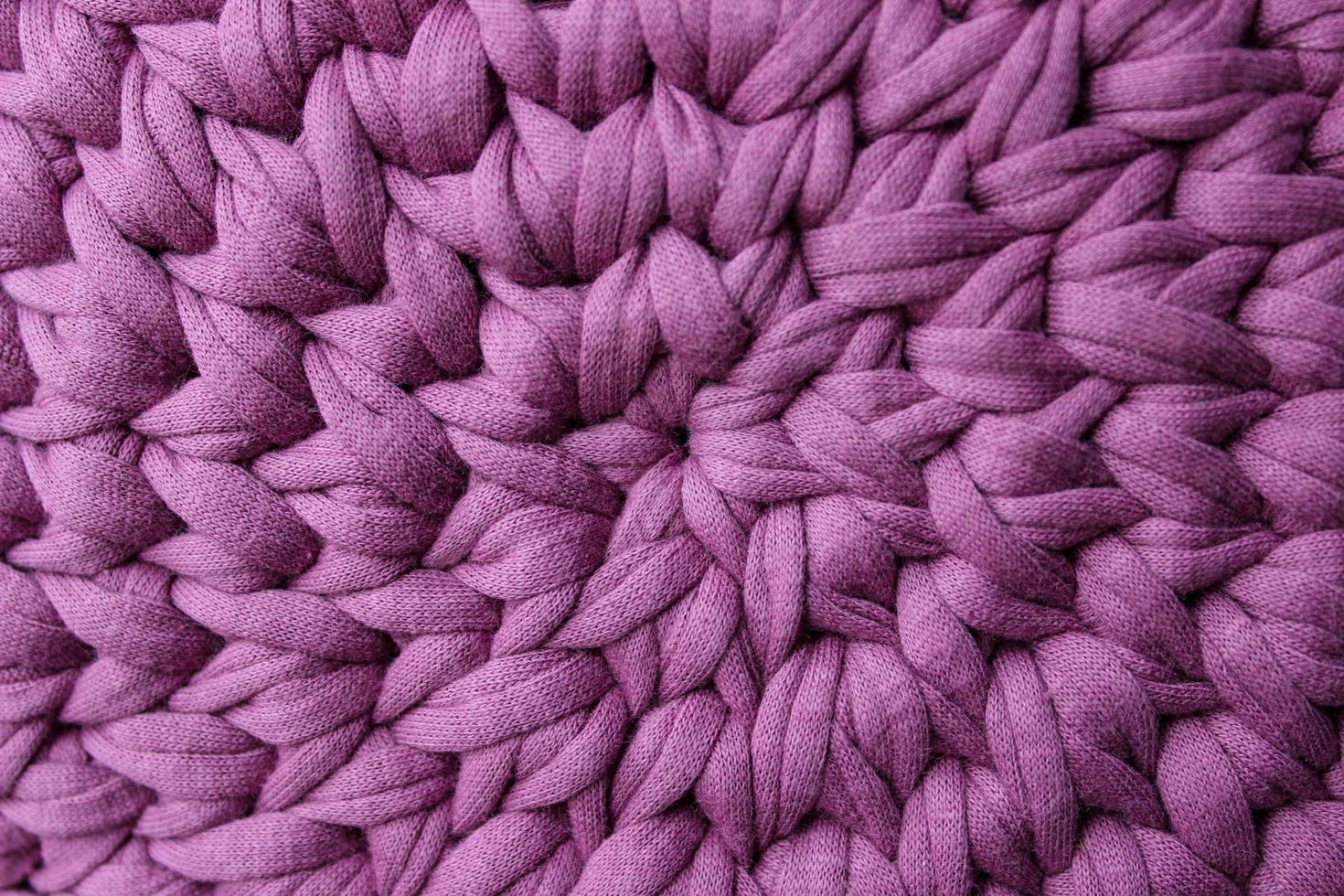 textura de círculo de fio de tricô rosa foto