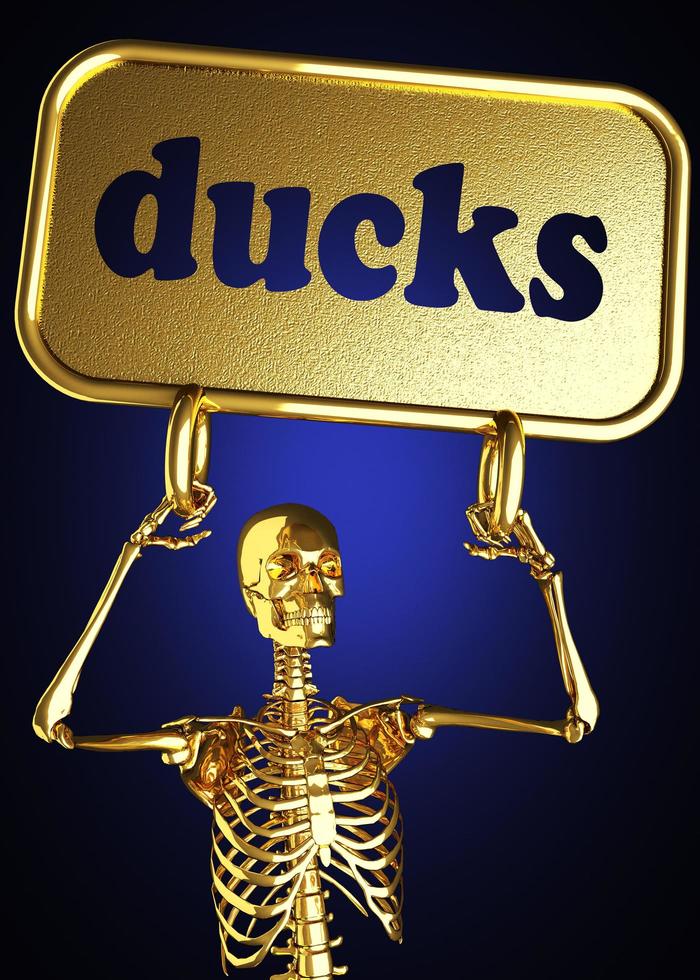 palavra de patos e esqueleto dourado foto