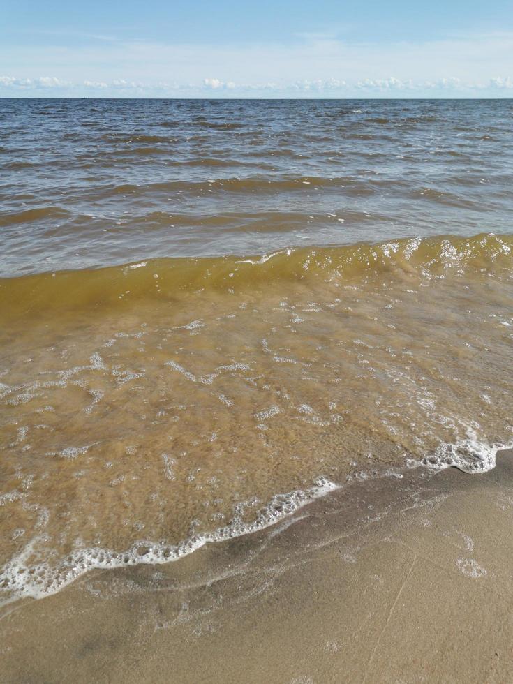 ondas e areia foto