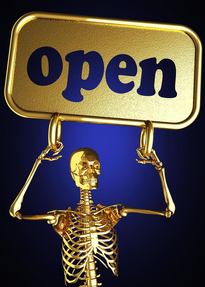 palavra aberta e esqueleto dourado foto