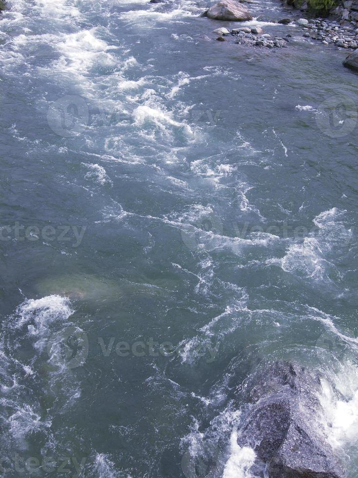 água do mar azul útil como pano de fundo foto